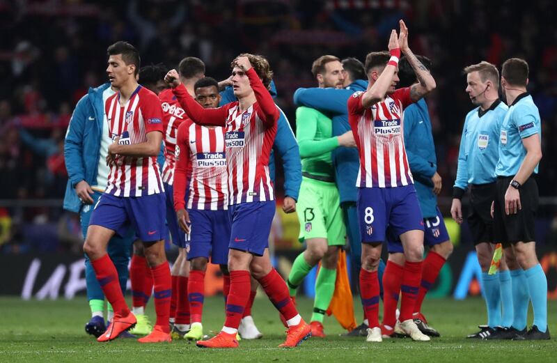 Atletico Madrid played applaud the fans at full-time. Reuters