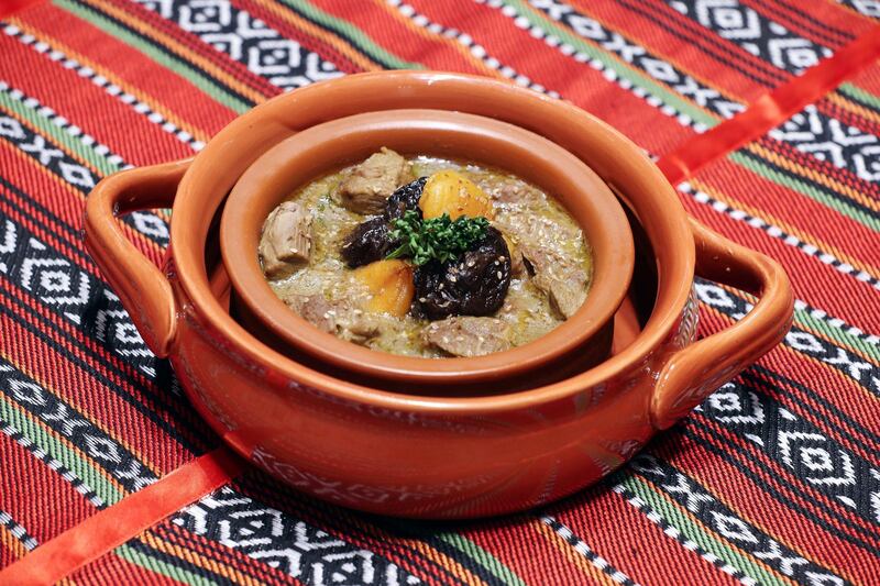 Dubai, United Arab Emirates - May 09, 2019: Iftar Signature Dish. Lamb Tajin from Courtyard by Marriott. Thursday the 9th of May 2019. Al Barsha, Dubai. Chris Whiteoak / The National

Chefs description:ÊTajine itself is a slow-cooked savory stew, typically made with sliced meat, poultry or fish together with vegetables or fruit. Spices, nuts, and dried fruits are also used. Common spices include ginger, cumin, turmeric, cinnamon, and saffron. Paprika and chili are used in vegetable tajines. The sweet and sour combination is common in tajine dishes like lamb with dates and spices. Tajines are generally served with bread.