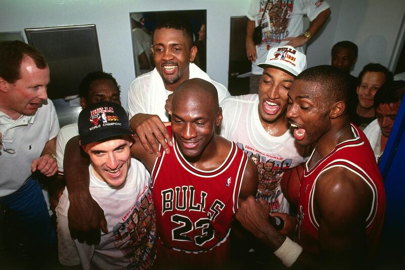 INGLEWOOD, CA- JUNE 12: Michael Jordan #23 of the Chicago Bulls celebrates following Game Five of the 1991 NBA Finals on June 12, 1991 at the Great Western Forum in Inglewood, California. NOTE TO USER: User expressly acknowledges and agrees that, by downloading and/or using this Photograph, user is consenting to the terms and conditions of the Getty Images License Agreement. Mandatory Copyright Notice: Copyright 1991 NBAE (Photo by Andrew D. Bernstein/NBAE via Getty Images)