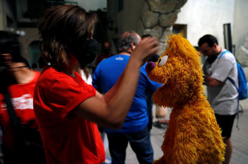 Staff of the children's programme 'Ahlan Simsim' prepare puppets for filming a scene on the set of the show in a studio in Amman, Jordan. Reuters