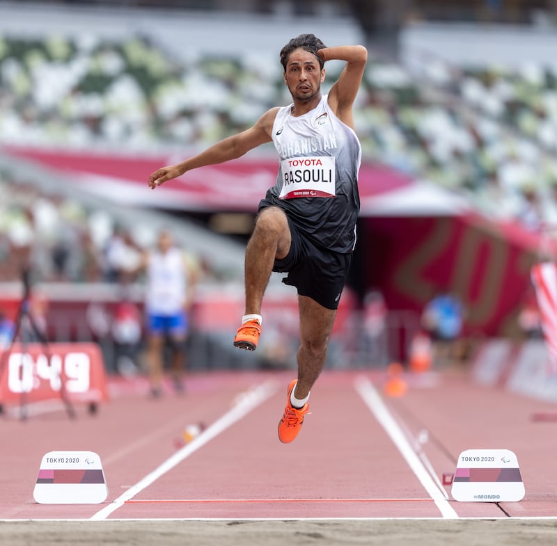 Hossain Rasouli competes in the men's long jump T46 final. EPA