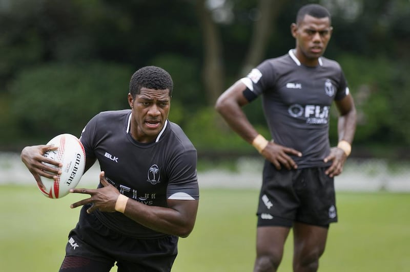 Fiji's Masivesi Dakuwaqa runs a drill during a rugby sevens training session in Hong Kong on April 4, 2016. Isaac Lawrence / AFP