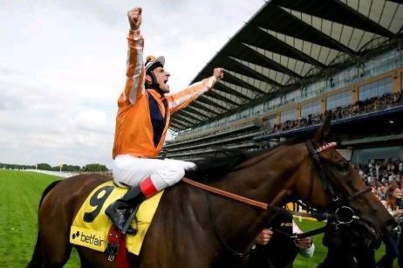 Andrasch Starke aboard Danedream wins the King George VI and Queen Elizabeth Stakes at Ascot racecourse on July 21. Alan Crowhurst / Getty Images