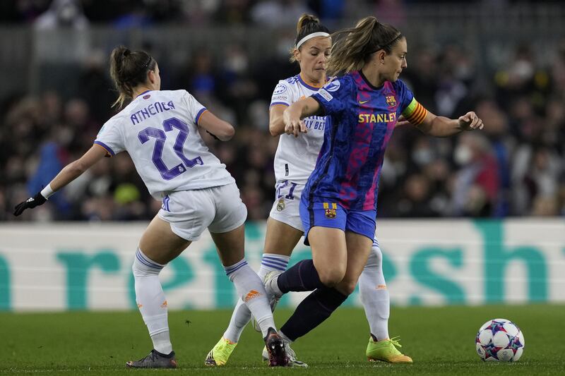 Barcelona's Alexia Putellas in action against Real Madrid's Claudia Zornoza and Athenea del Castillo. EPA 