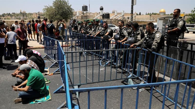 Men under the age of 50 have been banned from entering al-Aqsa Mosque compound Ammar Awad/Reuters