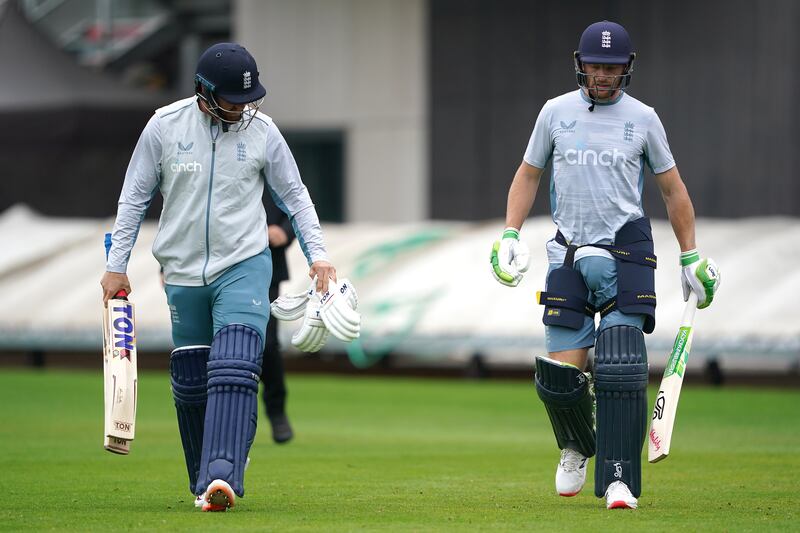 England's Jos Buttler and Jonny Bairstow during a training session at Old Trafford. PA
