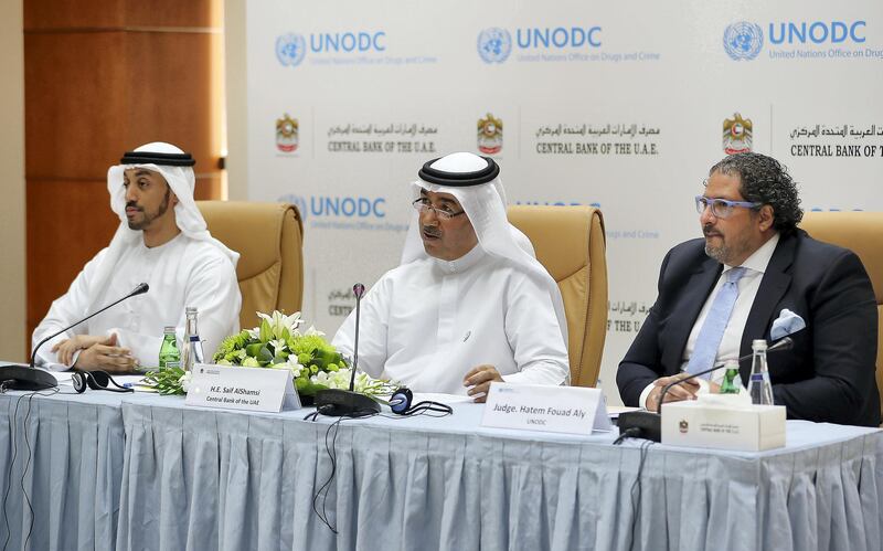 ABU DHABI,  UNITED ARAB EMIRATES , JUNE 23-2019 :- Left to Right - Ali Ba’Alawi, Acting Head of Financial Intelligence Unit  , Saif Al Shamsi , Assistant Governor of the Monetary Policy and Financial Stability Department at the Central Bank and Judge Hatem Fouad Aly, Special Representative of the Deputy Undersecretary of the UN, Executive Director of UNODC speaking during the press conference held at the Central Bank of UAE in Abu Dhabi. ( Pawan Singh / The National ) For Business. Story by Nada El Sawy

 
