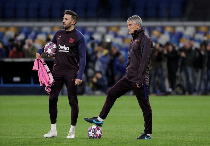 Barcelona manager Quique Setien, right, and his assistant Eder Sarabia. Reuters