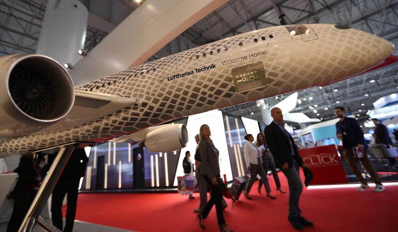 epa08010781 Visitors at the Lufthansa Technik pavilion during the Dubai Airshow 2019 at Dubai World Central - Al Maktoum International Airport, in Jebel Ali, Dubai, United Arab Emirates, 20 November 2019.  EPA/ALI HAIDER