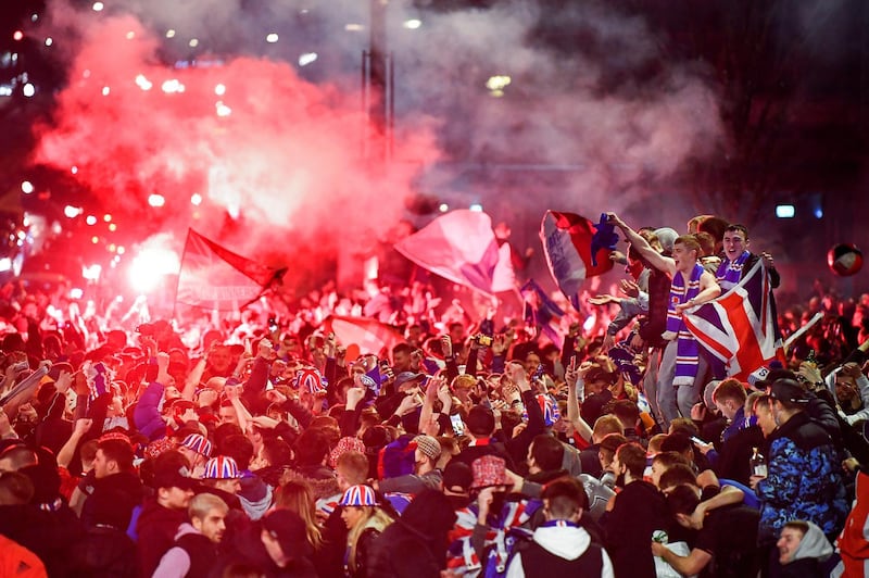 Rangers fans gather in George Square in Glasgow to celebrate the club winning the Scottish Premiership for the first time in 10 years. Getty