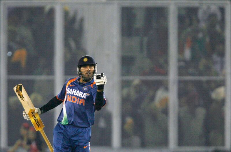 India's Yuvraj Singh celebrates after scoring a half century during the second Twenty20 cricket match against Sri Lanka in Mohali December 12, 2009. REUTERS/Punit Paranjpe (INDIA - Tags: SPORT CRICKET)

Picture Supplied by Action Images *** Local Caption *** 2009-12-12T154341Z_01_DEL27_RTRIDSP_3_CRICKET-LANKA.jpg *** Local Caption *** 2009-12-12T154341Z_01_DEL27_RTRIDSP_3_CRICKET-LANKA.jpg