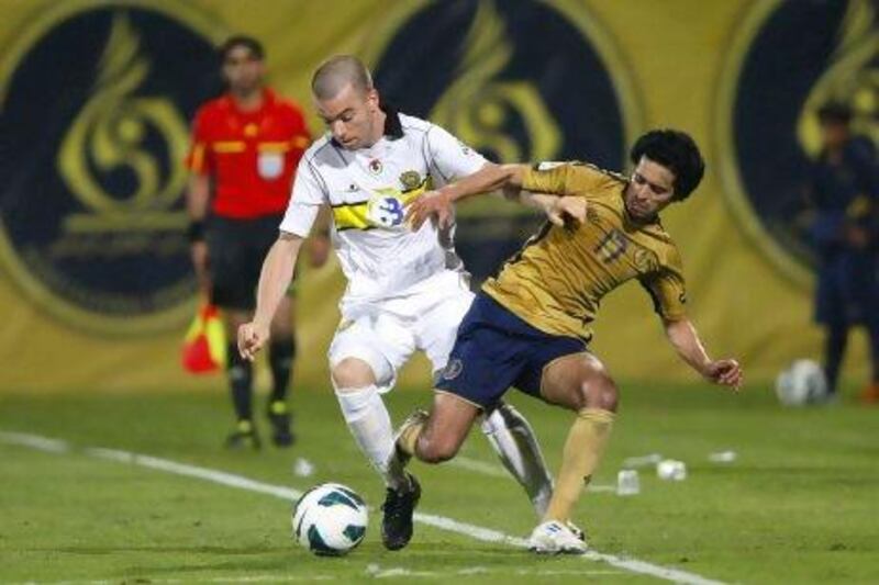 Al Wasl's Pro League campaign has been hampered by a knee injury to Mariano Donda, left, whose future is uncertain. Jake Badger for The National