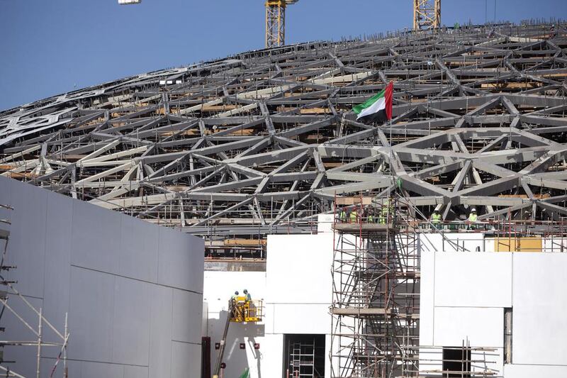 The Louvre Abu Dhabi’s 7,000-tonne dome has been placed into its final position atop four piers. Silvia Razgova / The National