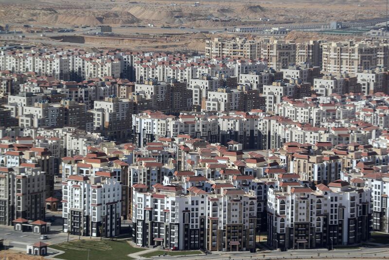 Residential buildings are seen in the New Administrative Capital (NAC) east of Cairo, Egypt March 8, 2021. Picture taken March 8, 2021. REUTERS/Mohamed Abd El Ghany
