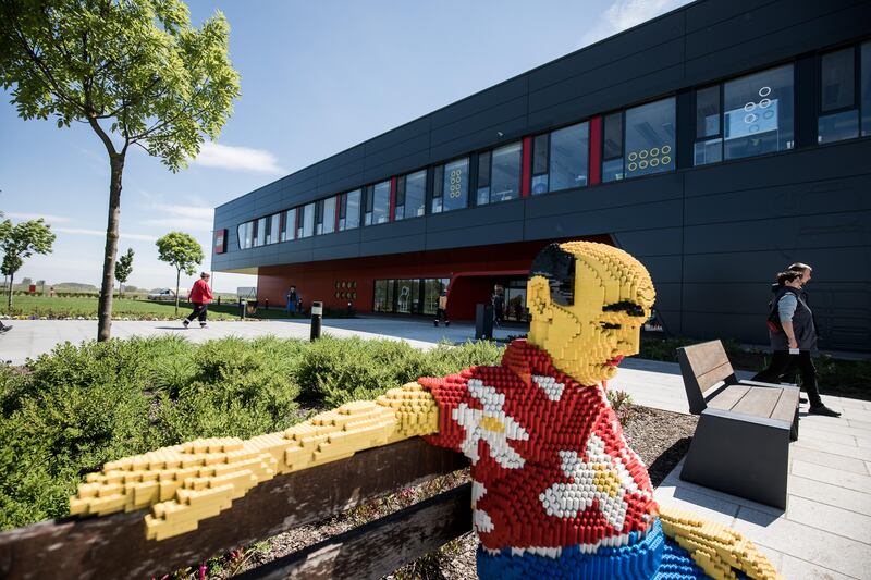 A Lego figure sits on a bench outside the Lego A/S plant, in Nyiregyhaza, Hungary, on Tuesday, May 9, 2017. After turning a loss-making company into the world’s most profitable toymaker, Lego is warning that it won’t be able to sustain the same growth rates it delivered in recent years. Photographer: Akos Stiller/Bloomberg