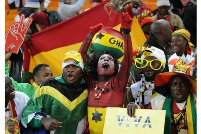 Ghana fans illuminated the World Cup in South Africa with their colourful attire and non-stop singing. Tonight, Wembley Stadium can expect much of the same as the Black Stars face England. Monirul Bhuiyan / AFP