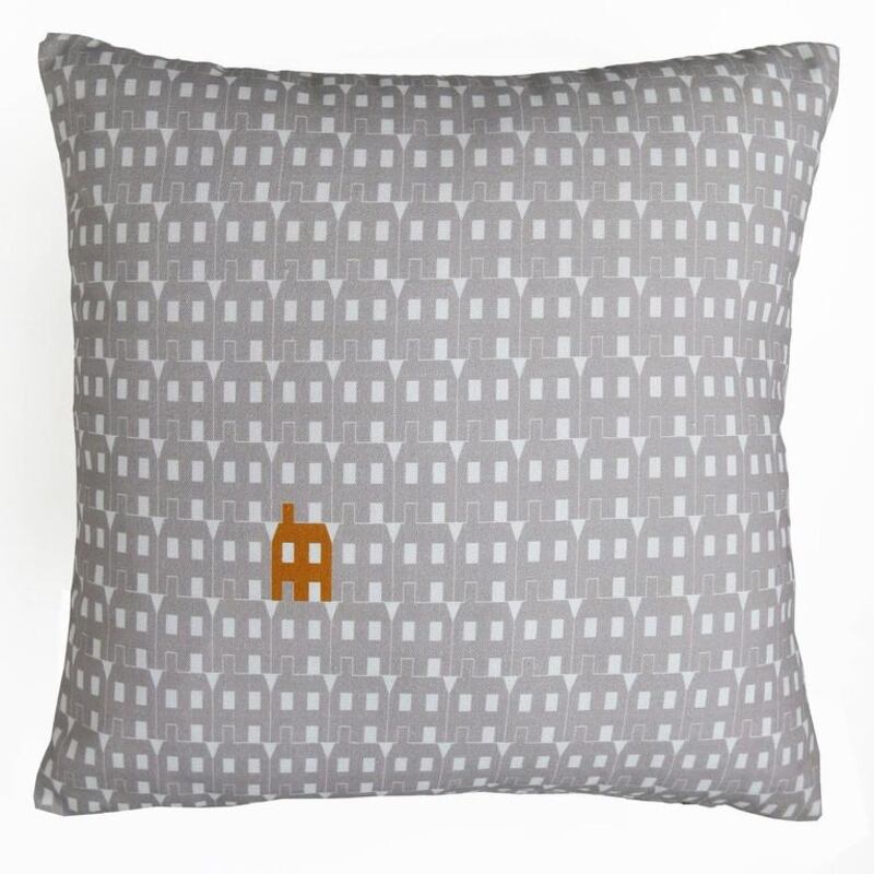 Grey paper house design cushion. Courtesy of Oscar Francis Ltd