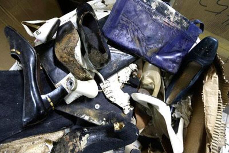 Some of Imelda Marcos's shoe collection in Manila has been damaged by floods, termites and neglect.
