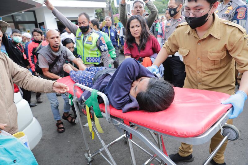 Rescuers carry an injured victim of the earthquake at a hospital in Cianjur, West Java, Indonesia. EPA