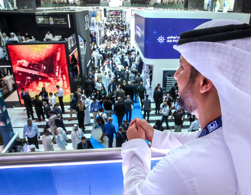 Visitors crowd the aisles on day two at Adipec 2023