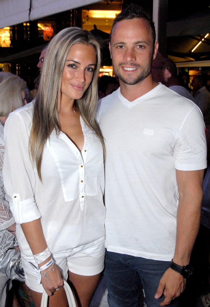 JOHANENSBURG, SOUTH AFRICA - JANUARY 26: (SOUTH AFRICA OUT) Oscar Pistorius and Reeva Steenkamp at the Tasha's All White Party on January 26, 2012 in Johannesburg, South Africa. (Photo by Waldo Swiegers/Heat Magazine/Gallo Images/Getty Images)