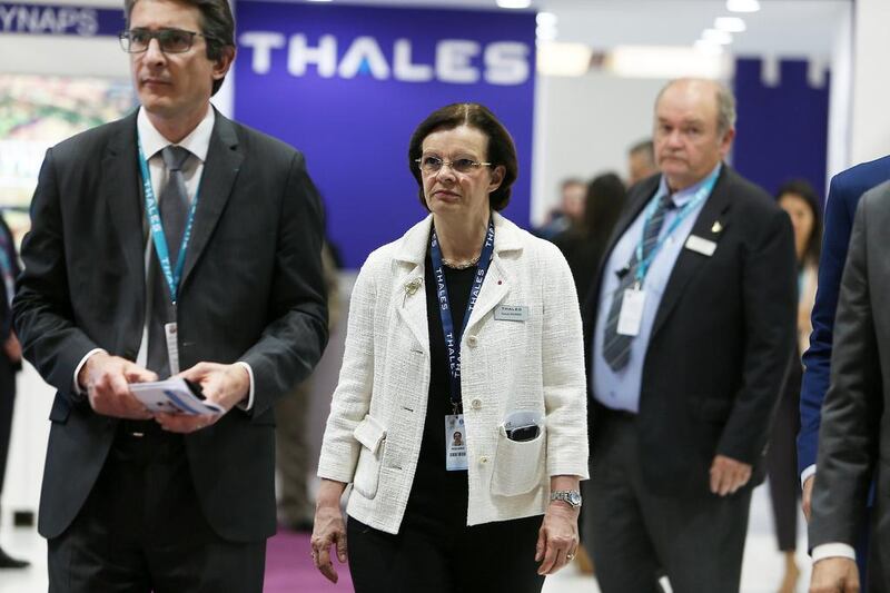 Pascale Sourisse, centre, the vice president of Thales, said that Arabian Gulf countries ‘have understood the diversified types of threat, and it’s about protection of its territories, citizens and goods’. At left is Patrice Caine, the chief executive of Thales Group. Pawan Singh / The National