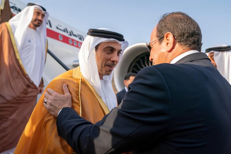 CAIRO, EGYPT - May 15, 2019: HH Sheikh Mansour bin Zayed Al Nahyan, UAE Deputy Prime Minister and Minister of Presidential Affairs (C), is received by HE Abdel Fattah El Sisi, President of Egypt (R), upon arrival at Cairo international Airport. Seen with HH Sheikh Abdullah bin Zayed Al Nahyan, UAE Minister of Foreign Affairs and International Cooperation (L).

( Mohamed Al Hammadi / Ministry of Presidential Affairs )
---