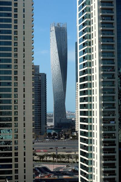 Dubai, United Arab Emirates - Reporter: N/A: Stock and Standalone. General view of Cayan Tower in the marina on a clear day in Dubai. Wednesday, February 5th, 2020. JLT, Dubai. Chris Whiteoak / The National