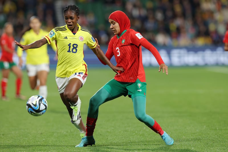 Linda Caicedo of Colombia fights for the ball with Nouhaila Benzina of Morocco. EPA