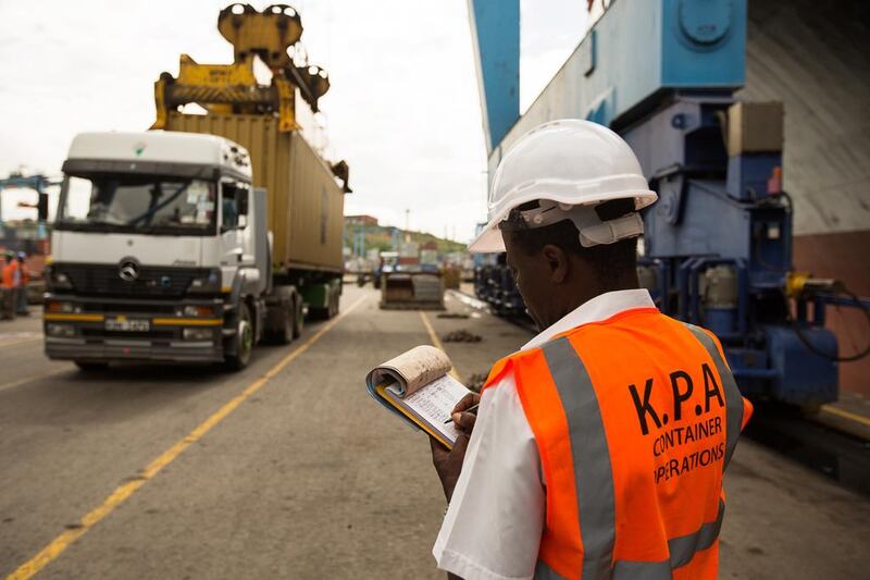 A dock worker for the Kenya Ports Authority Mombasa. Many shipments arrive at the port from staging grounds in the UAE. Trevor Snapp / Bloomberg

