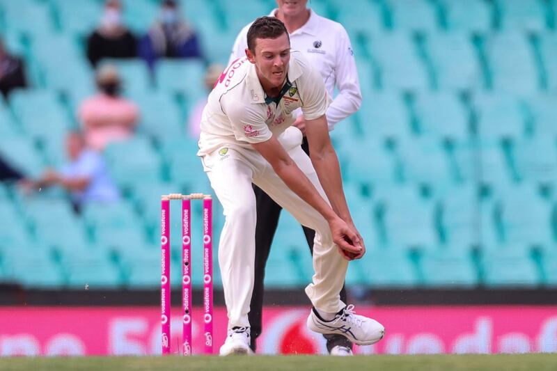 Australia bowler Josh Hazlewood takes a catch to dismiss India's Rohit Sharma. AFP