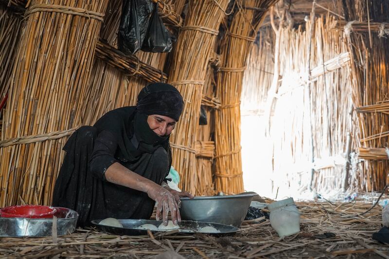 Al Ebaa Abed makes bread for her family