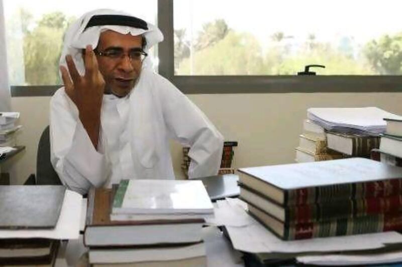 The Emirati poet Ahmed Rashed Thani at the Adach office in Abu Dhabi.