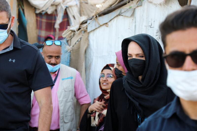 Jolie inside a camp for people displaced by war in Lahej, Yemen. Reuters