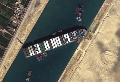 The 'Ever Given' container ship runs aground in the Suez Canal. Reuters