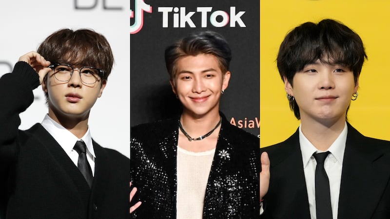 BTS members Jin, RM and Suga have test positive for Covid-19. AP Photo