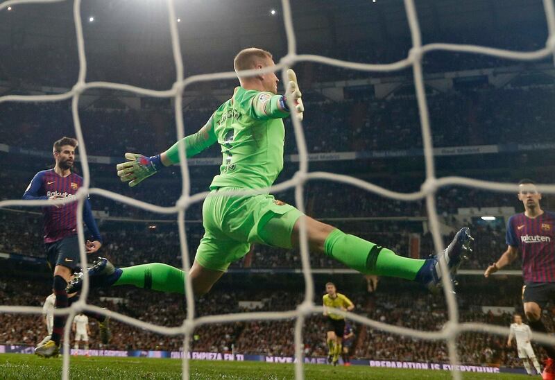 Barcelona goalkeeper Marc-Andre ter Stegen spreads himself to make a save. AP