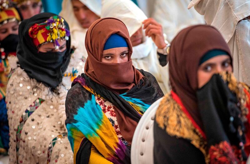 A formal wedding ceremony, too, takes place during the annual Engagement Moussem festival, typically by signing a marital contract followed by individual family ceremonies later in the year. Photo: Fadel Senna / AFP