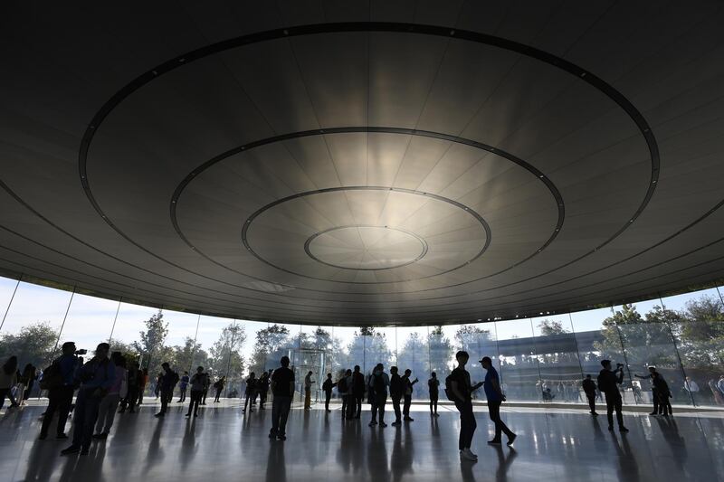 Attendees arrive for an Apple event at the Steve Jobs Theatre in Cupertino, California. Bloomberg