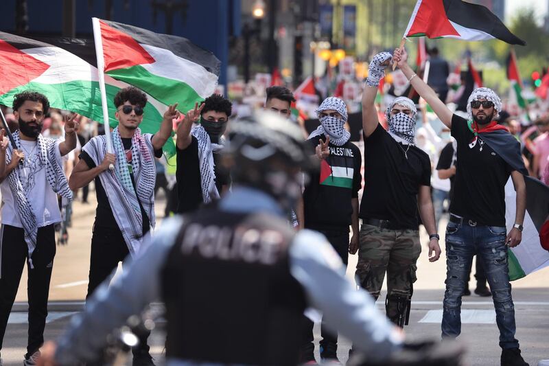 People in Chicago, Illinois, protest against the Israeli air strikes in the Gaza Strip. AFP