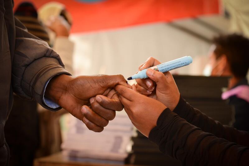 An Ethiopian man has his thumb inked after casting his ballot in the presidential elections at a polling station in Addis Ababa, Ethiopia. EPA