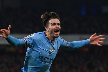 Manchester City's English midfielder Jack Grealish celebrates after scoring his team second goal during the English Premier League football match between Arsenal and Manchester City at the Emirates Stadium in London on February 15, 2023.  (Photo by Glyn KIRK / AFP) / RESTRICTED TO EDITORIAL USE.  No use with unauthorized audio, video, data, fixture lists, club/league logos or 'live' services.  Online in-match use limited to 120 images.  An additional 40 images may be used in extra time.  No video emulation.  Social media in-match use limited to 120 images.  An additional 40 images may be used in extra time.  No use in betting publications, games or single club/league/player publications.   /  