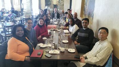 Dr Barney Graham, deputy director of the National Institutes of Health Vaccine Research Centre, (back and centre) with Dr Hadi Yassine (back and centre right) and other researchers and staff.