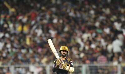 Kolkata Knight Riders captain Dinesh Karthik gestures during the 2018 Indian Premier League (IPL) Twenty20 first eliminator cricket match between Kolkata Knight Riders and Rajasthan Royals at the Eden Gardens Cricket Stadium in Kolkata on May 23, 2018.  / AFP PHOTO / Dibyangshu SARKAR / ----IMAGE RESTRICTED TO EDITORIAL USE - STRICTLY NO COMMERCIAL USE----- / GETTYOUT