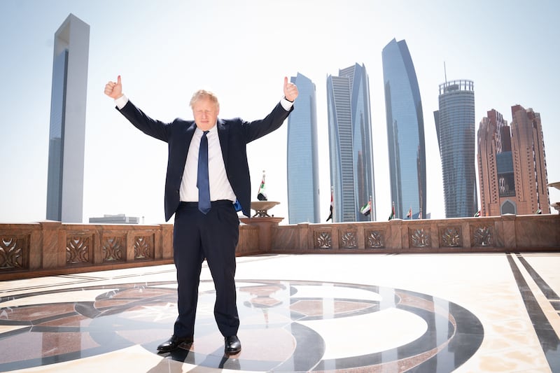 Mr Johnson arrives for a media interview at the Emirates Palace hotel in Abu Dhabi, in March 2022. Getty Images