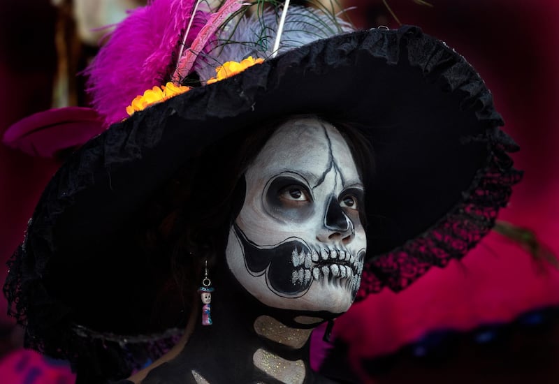 Tonantzin Guerrero is dressed as a "Catrina" to perform in a play promoting the upcoming Day of the Dead holiday, in the Xochimilco borough of Mexico City. AP Photo