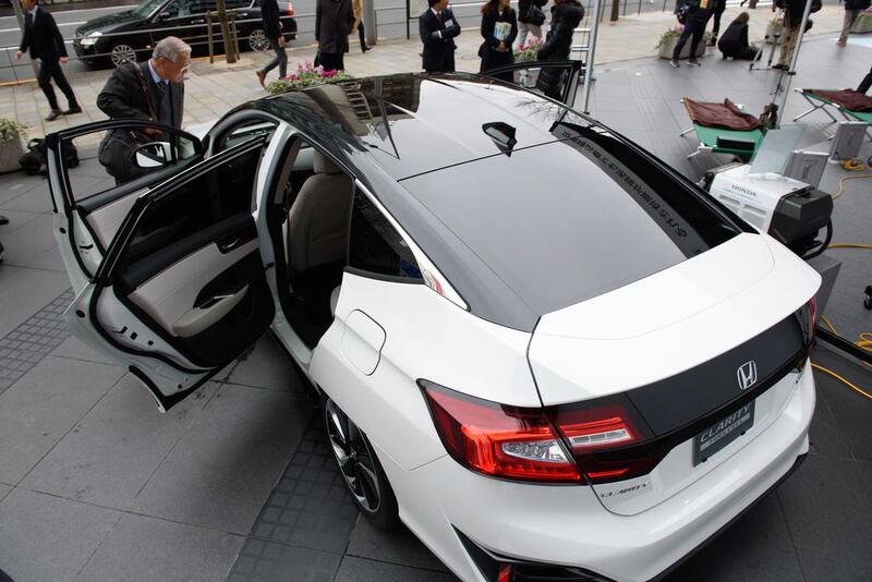 A Honda Clarity Fuel Cell vehicle is displayed during an unveiling in Tokyo, Japan, on Thursday, March 10, 2016. Honda, beginning sales of its Clarity Fuel Cell sedan in Japan, said joint work with General Motors will help bring hydrogen-powered vehicle costs down to the level of hybrids within the next decade. Akio Kon /Bloomberg