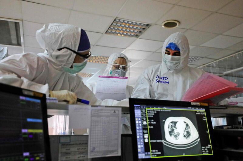 Iranian medical personnel, wearing protective gear, work at the quartine ward of a hospital in Tehran on March 1, 2020. A plane carrying UN medical experts and aid touched down on March 2, 2020, in Iran on a mission to help it tackle the world's second-deadliest outbreak of coronavirus as European powers said they would send further help. - === RESTRICTED TO EDITORIAL USE - MANDATORY CREDIT "AFP PHOTO / HO / MIZAN NEWS AGENCY" - NO MARKETING NO ADVERTISING CAMPAIGNS - DISTRIBUTED AS A SERVICE TO CLIENTS ===
 / AFP / MIZAN NEWS AGENCY / KOOSHA MAHSHID FALAHI / === RESTRICTED TO EDITORIAL USE - MANDATORY CREDIT "AFP PHOTO / HO / MIZAN NEWS AGENCY" - NO MARKETING NO ADVERTISING CAMPAIGNS - DISTRIBUTED AS A SERVICE TO CLIENTS ===
