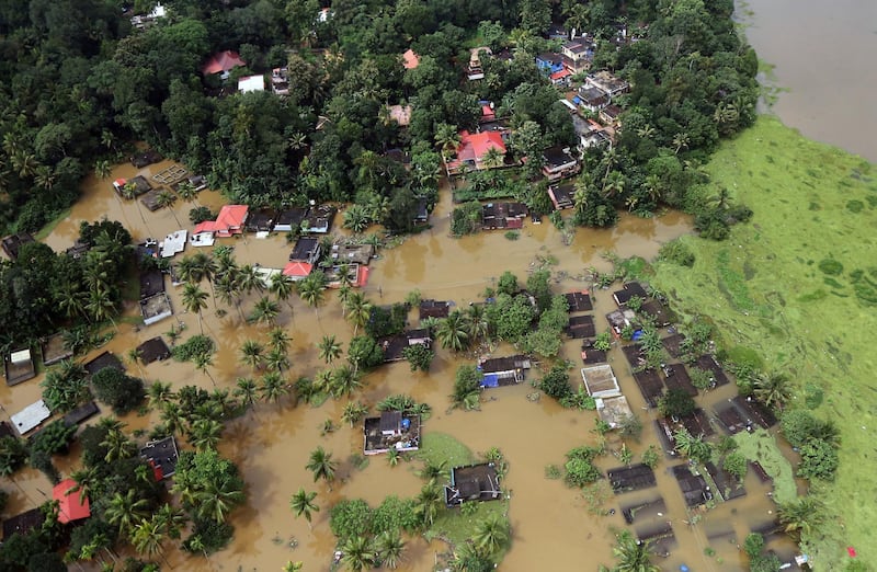Partially submerged houses in Kerala. Reuters