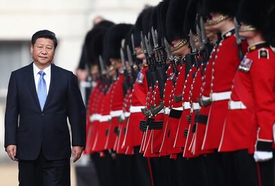 Xi Jinping inspects a guard of honour in London in 2015. Getty Images